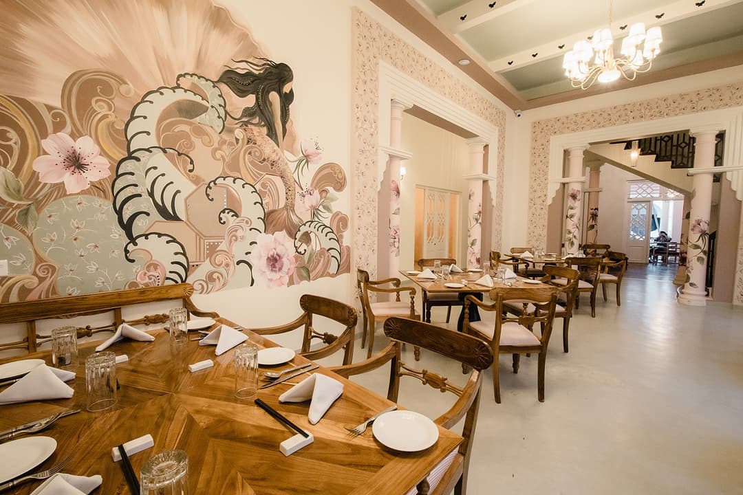 Restaurant wide with mural and seating, Padmaraga Galle Fort