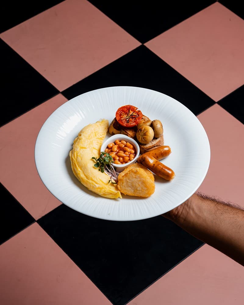 Plated dish on checkered surface, Padmaraga Galle Fort