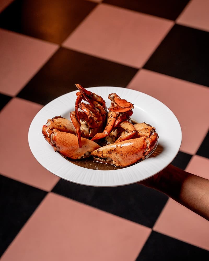 Crab on checkered surface, Padmaraga Galle Fort restaurant