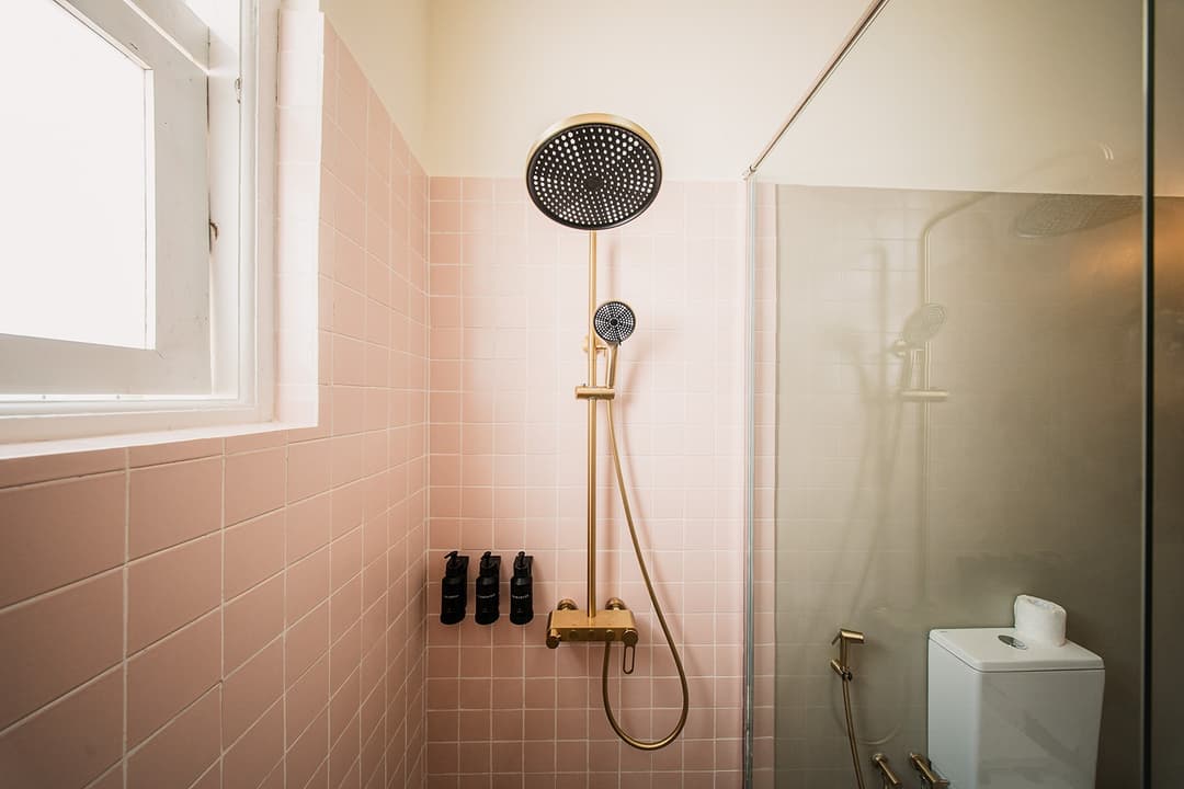 Bathroom with grey tile shower, Padmaraga Galle Fort