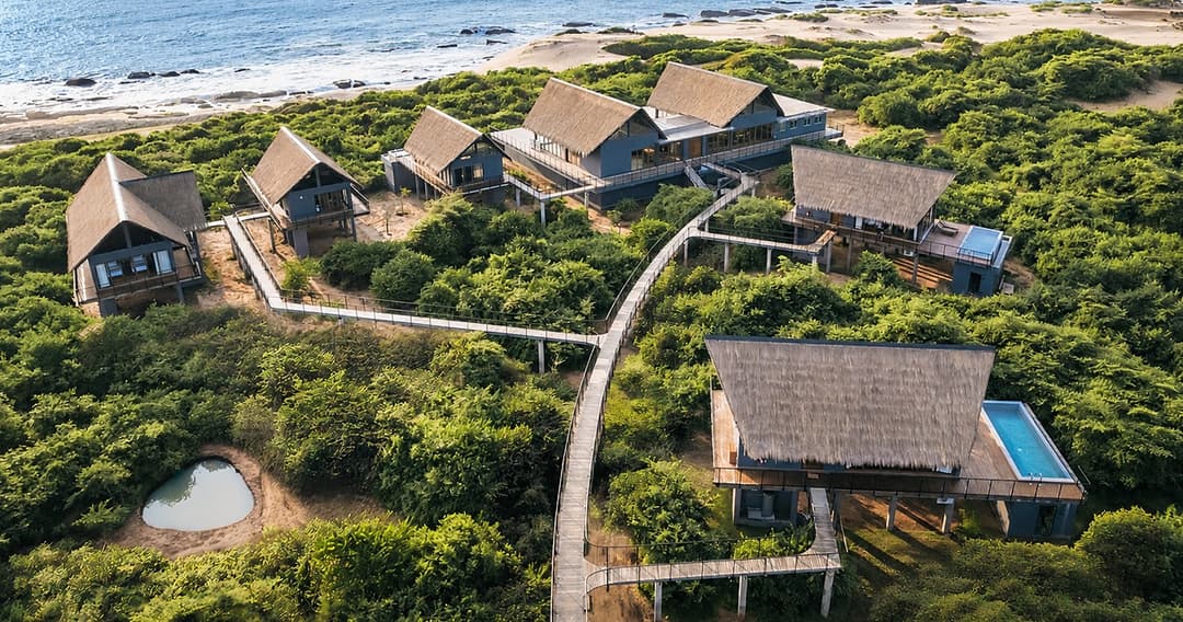 Aerial villa ocean and forest wide, Kotiyagala Yala