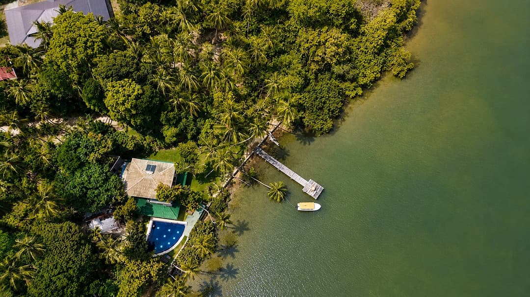 Kingfisher House Koggala aerial view of jetty and lakeside buildings