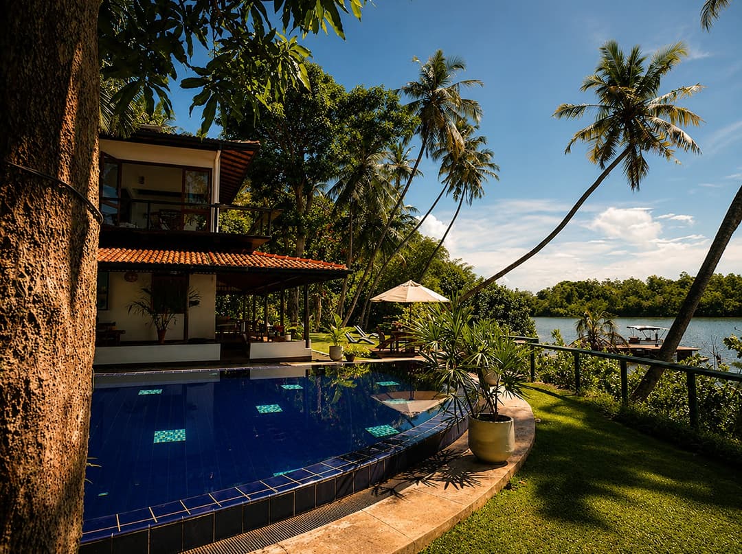 Kingfisher House Koggala exterior with pool and palm trees