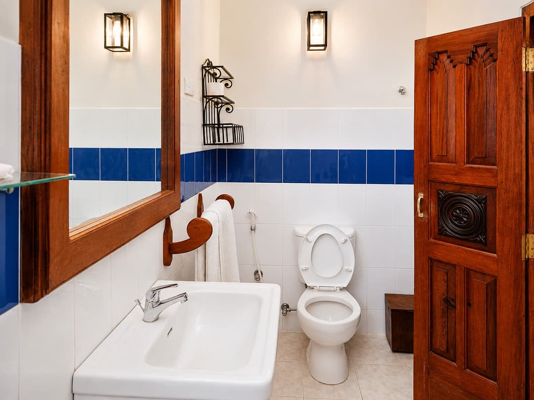 Koggala Lake bathroom with blue tile and sink