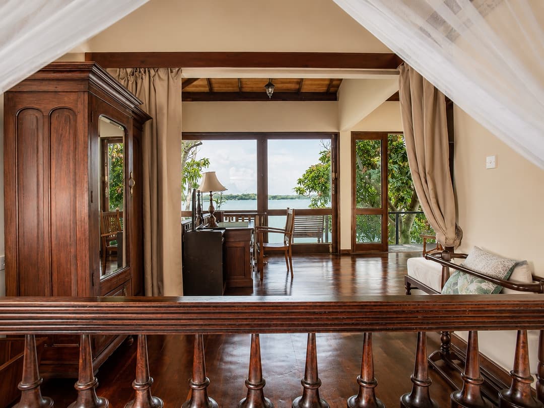 Koggala Lake bedroom with loft staircase interior