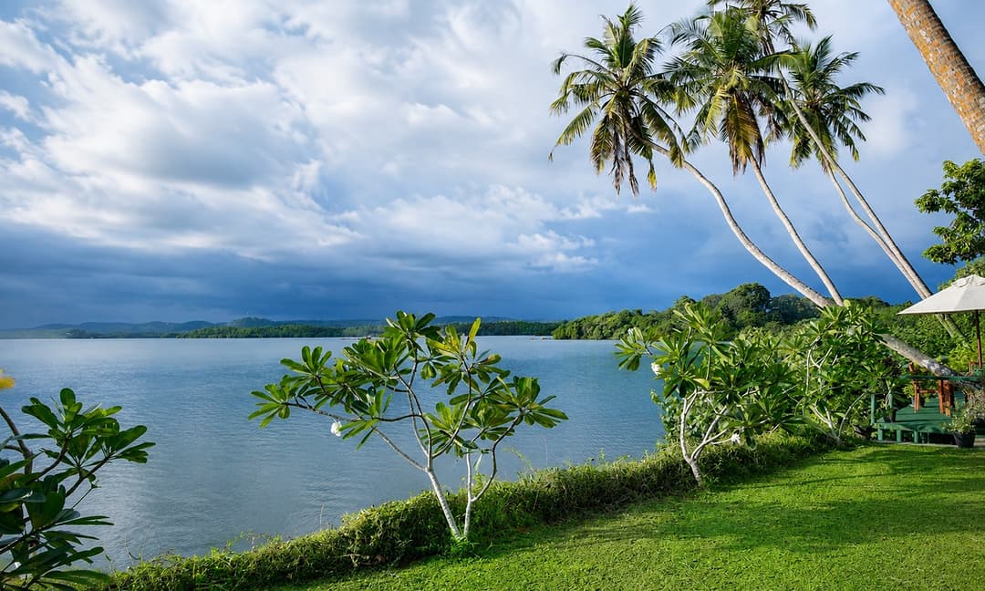 Koggala Lake water view under a dramatic sky