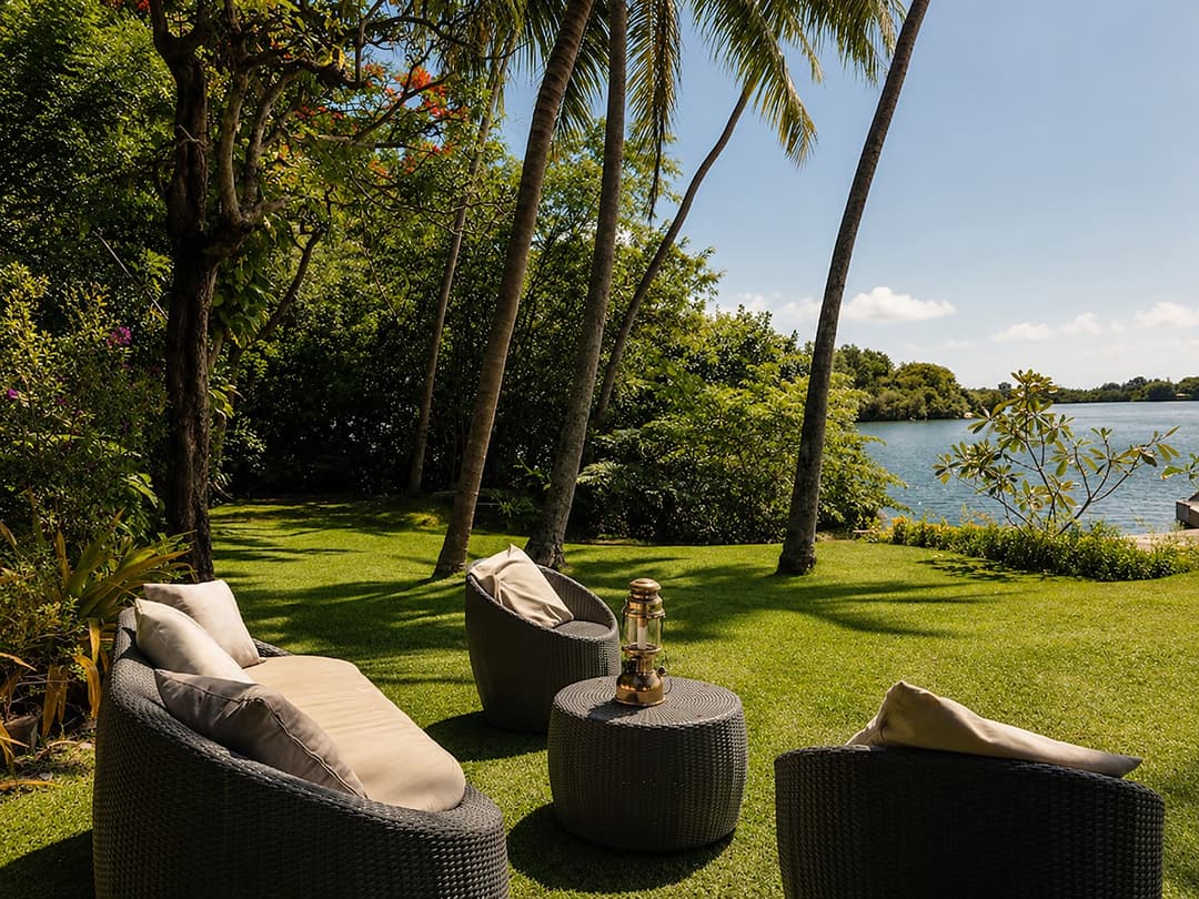 Koggala Lake garden loungers with palm tree view