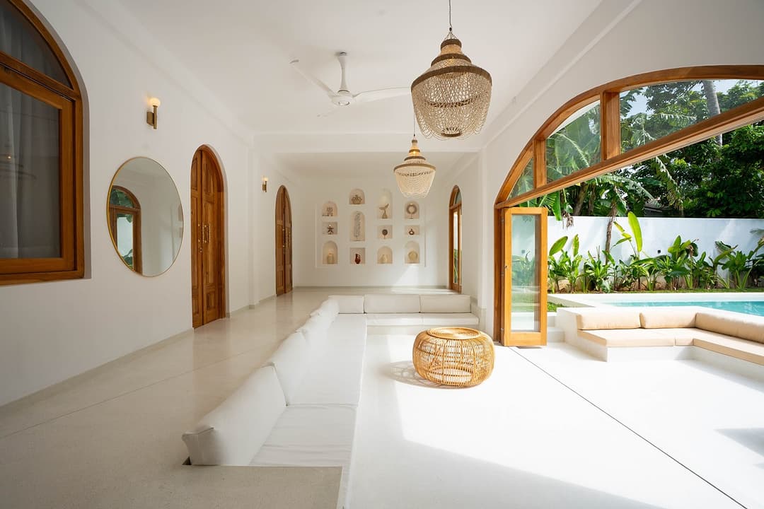 Arco House Ahangama living room with arches and pool view