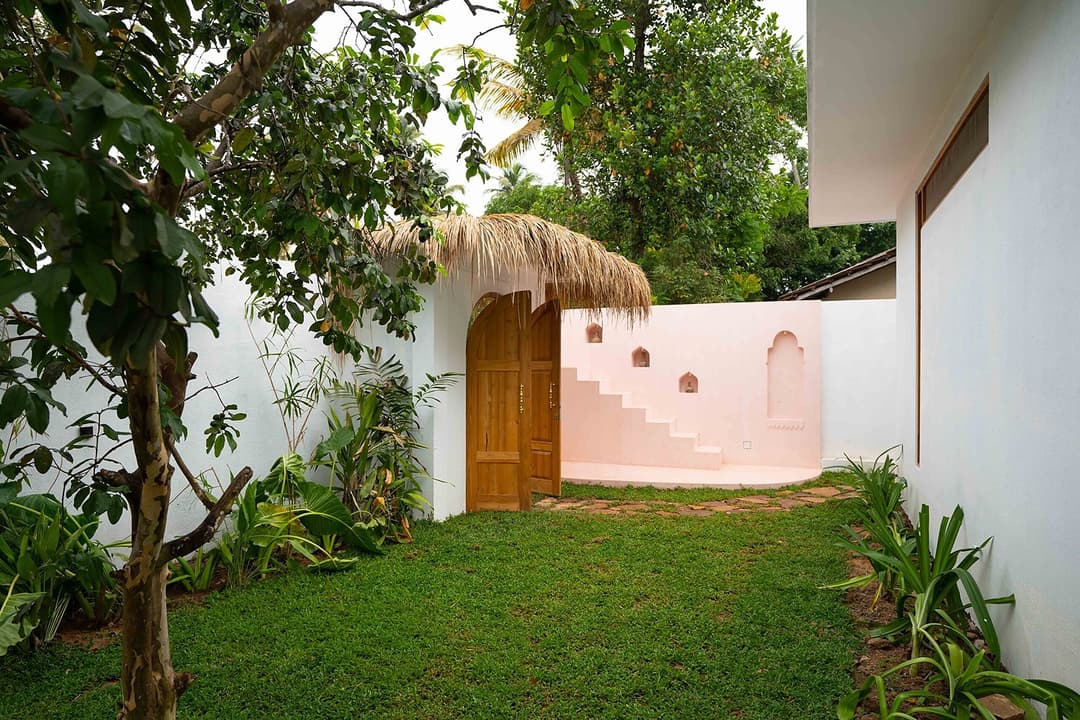 Ahangama garden steps with arched door