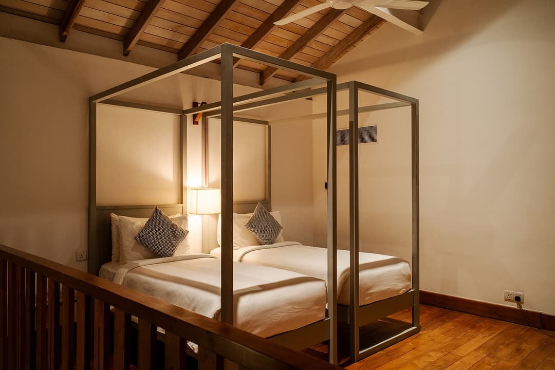 Fort Bazaar Galle loft bedroom with canopy bed