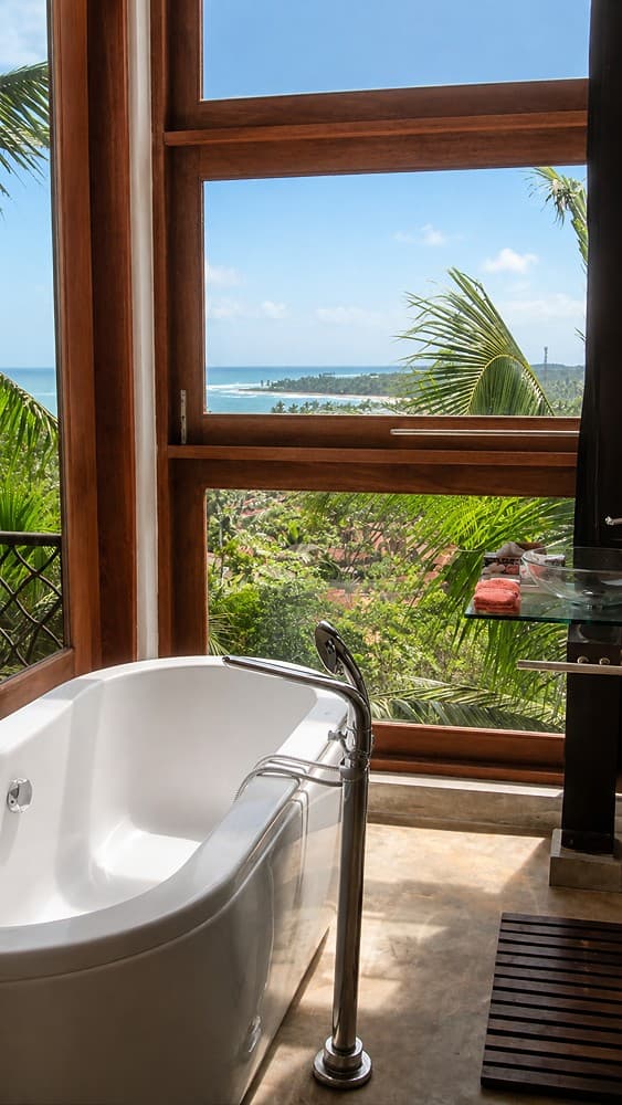 Mirissa bathroom with freestanding tub and view
