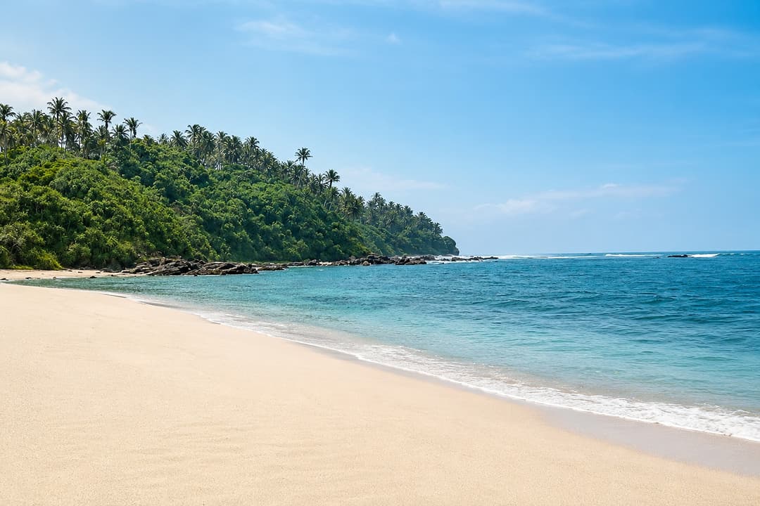 Mirissa beach cove headland view