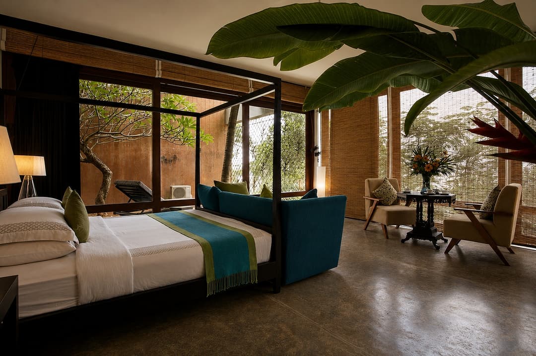 Mirissa bedroom with four poster bed and plant