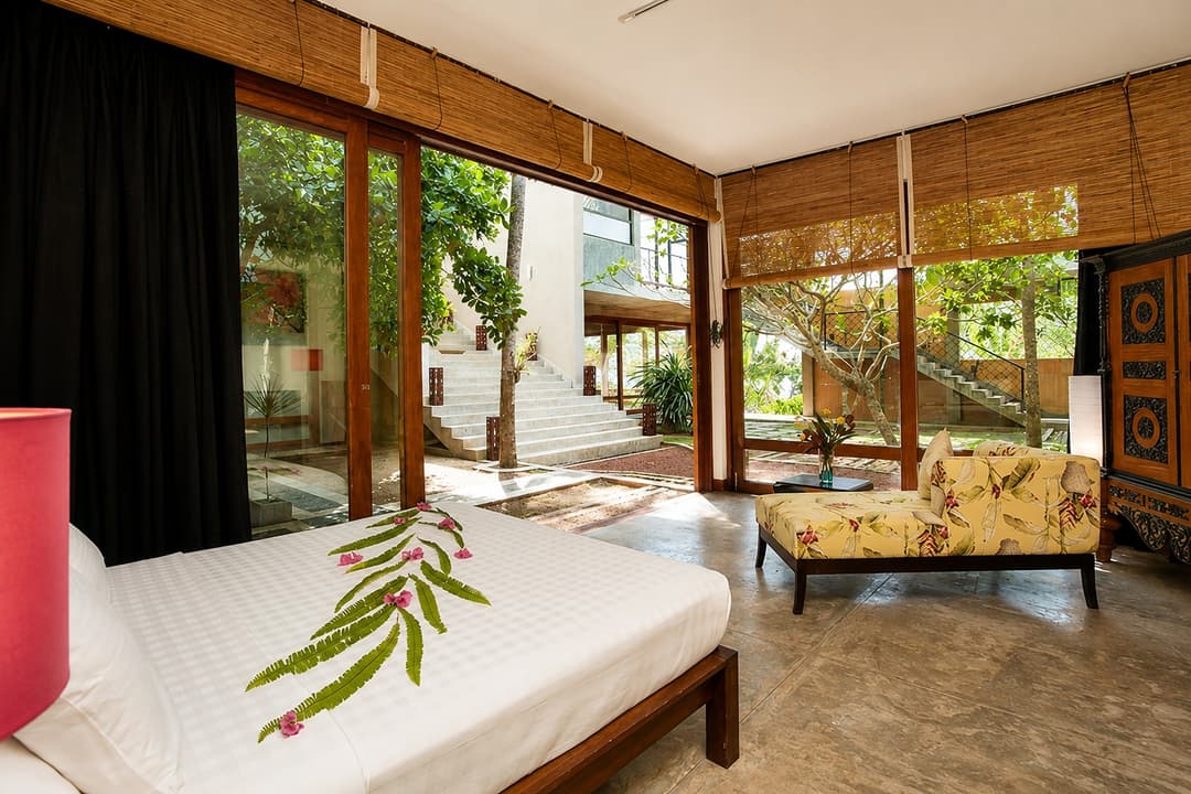 Mirissa bedroom with striped bedding interior