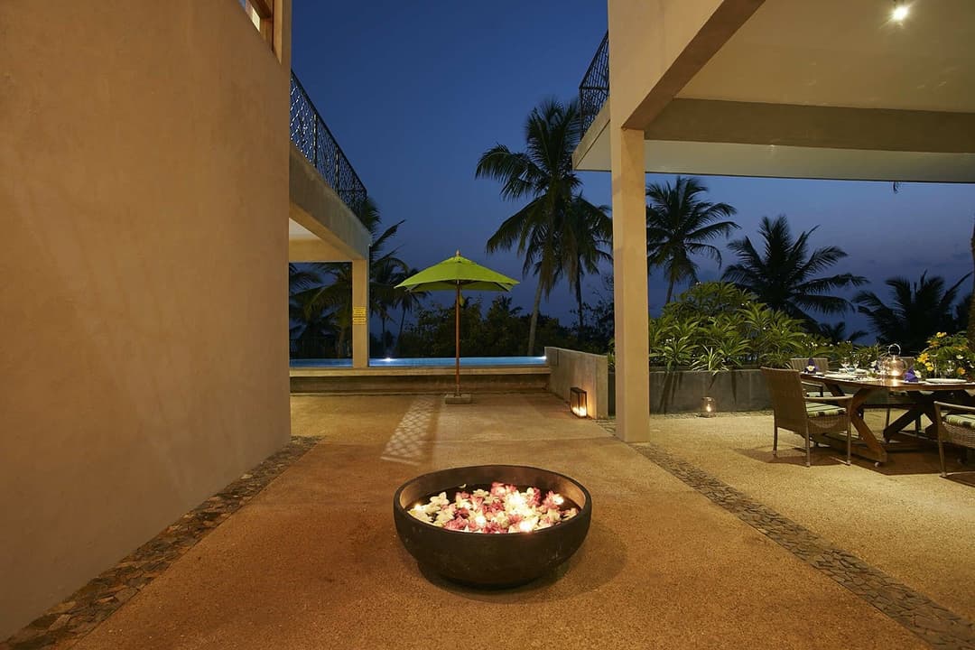 The Cape Mirissa pool steps with ocean view