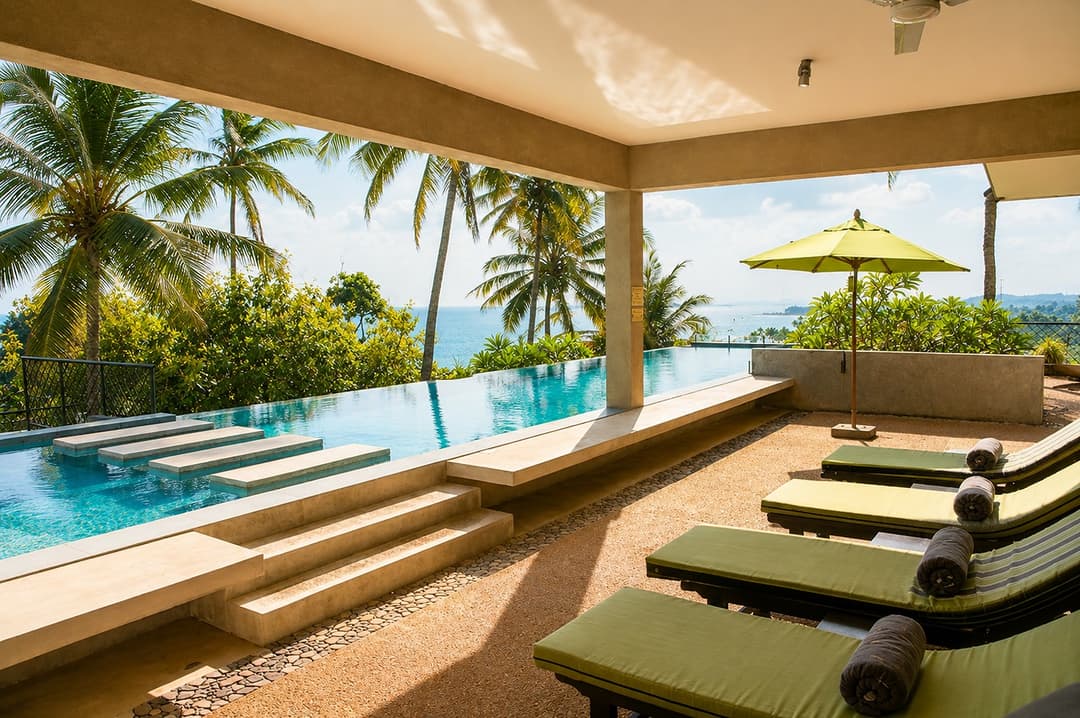 villa imagThe Cape Mirissa pool steps with ocean viewe