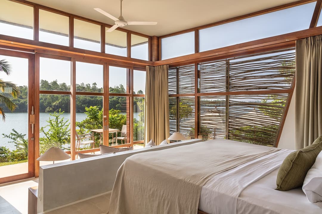 Tri Ahangama Family Villa bedroom with lake view