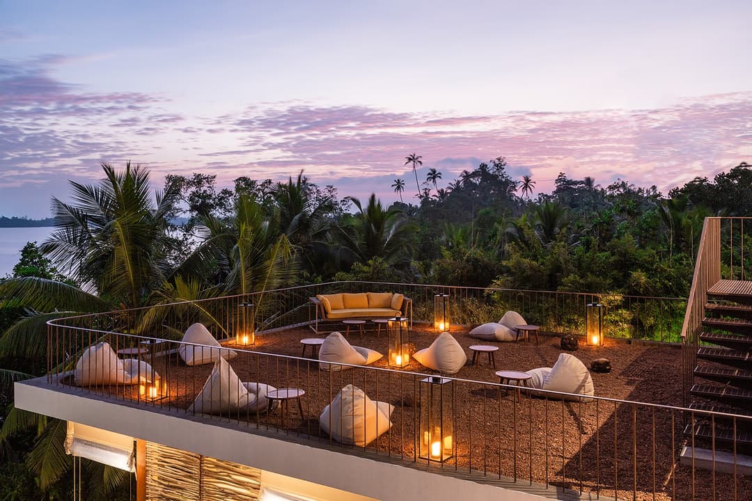 Tri Ahangama sunset deck loungers at dusk
