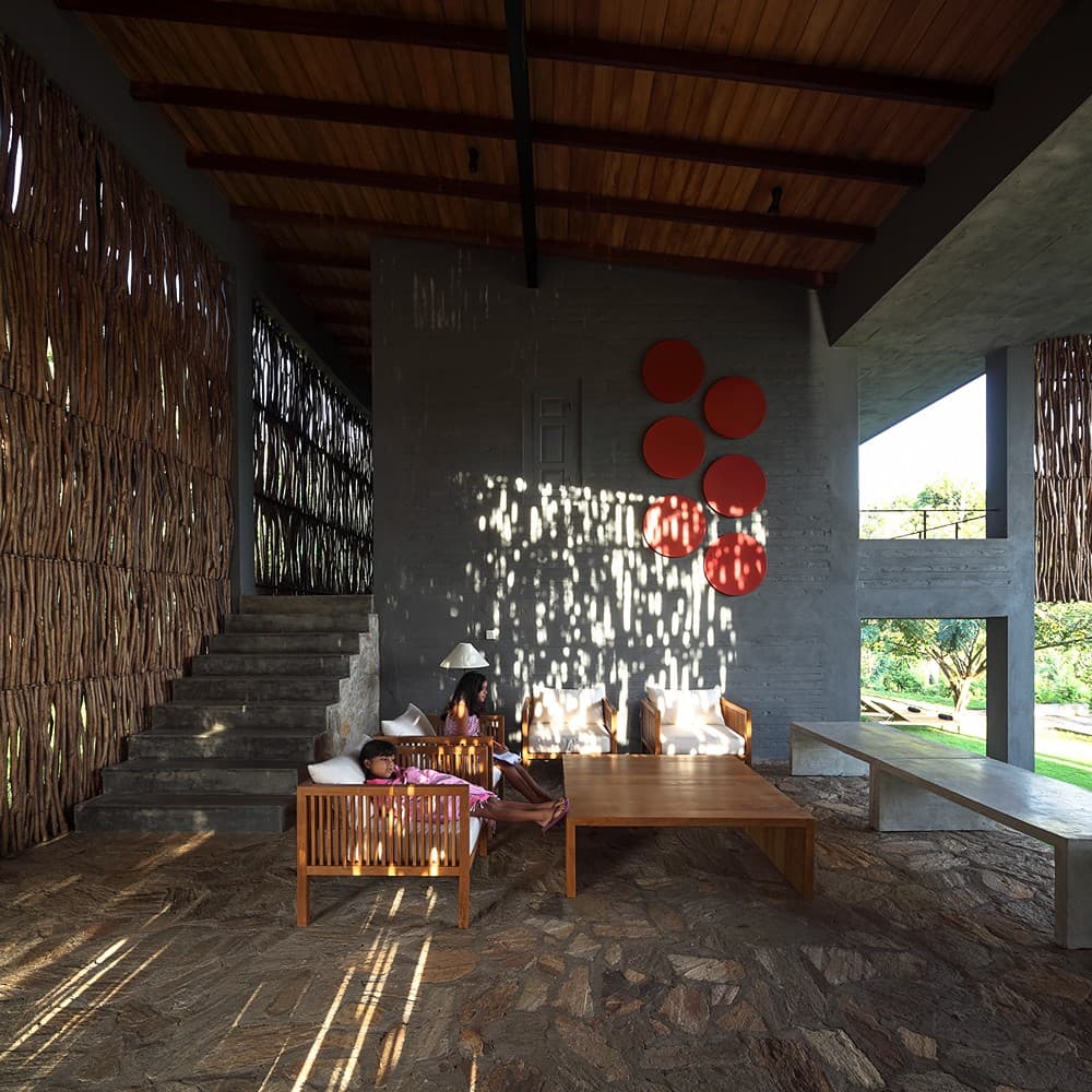 Digana lounge with staircase and red art