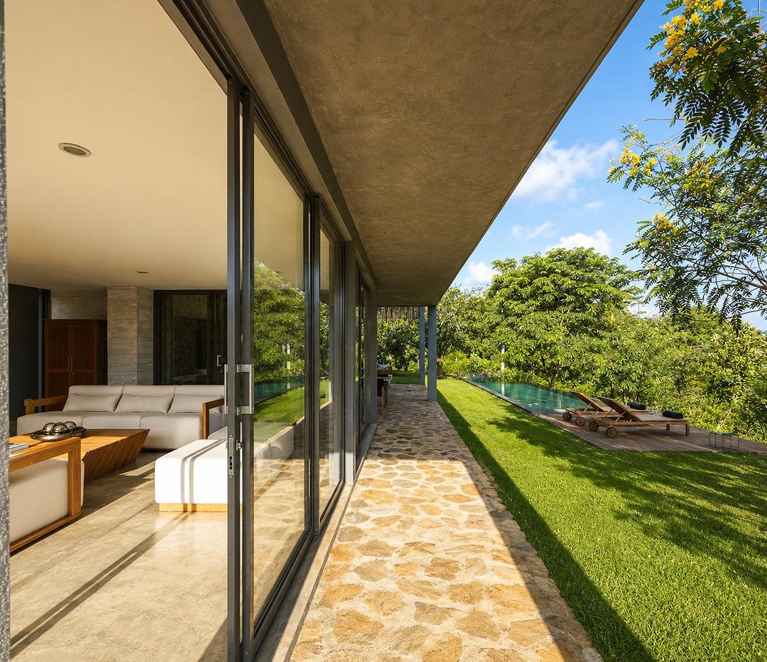 Digana lounge corridor with glass doors to lawn