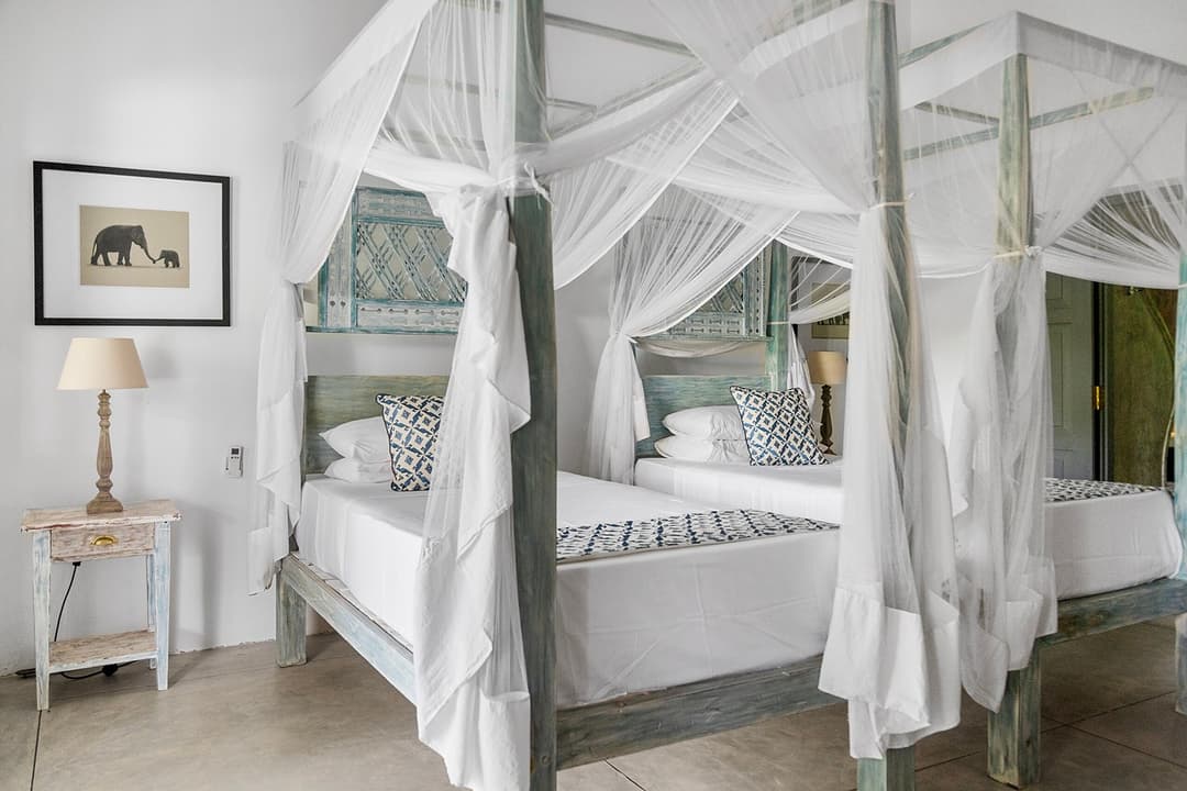 Ahangama room with twin canopy beds