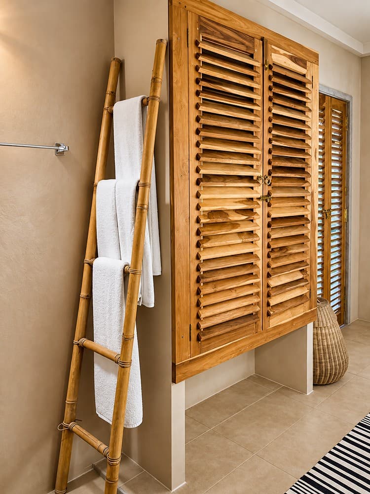 Villa Marisol bathroom with towel ladder and shutters