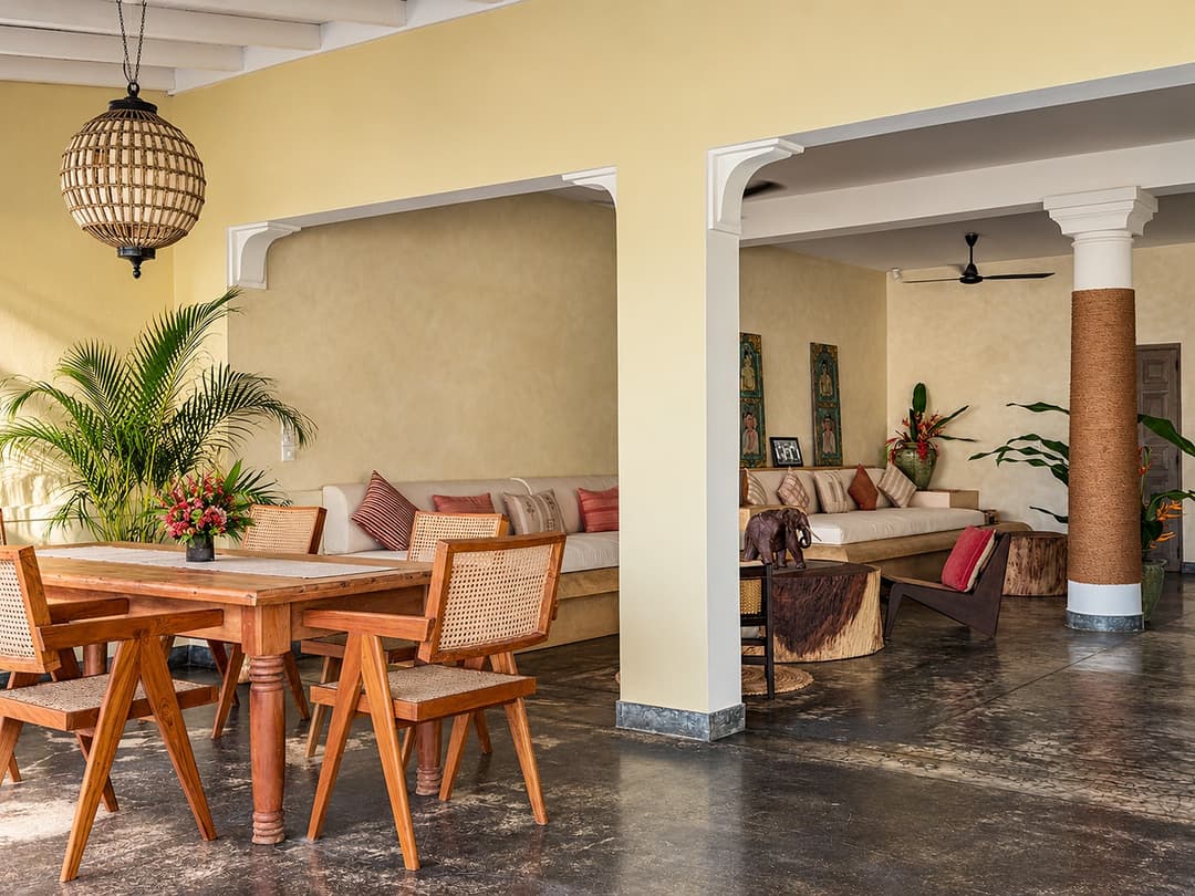 Villa Marisol pergola dining with cane chairs