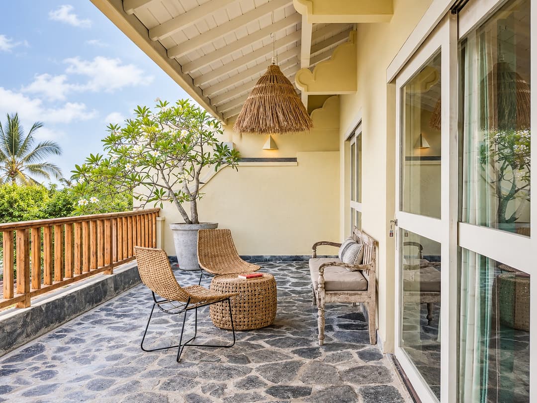 Villa Marisol veranda seating with glass doors