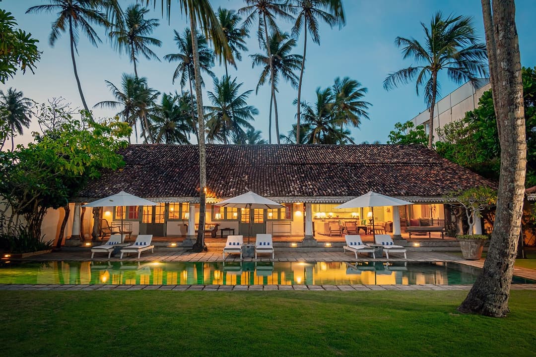 Tide House Habaraduwa pool at dusk with loungers