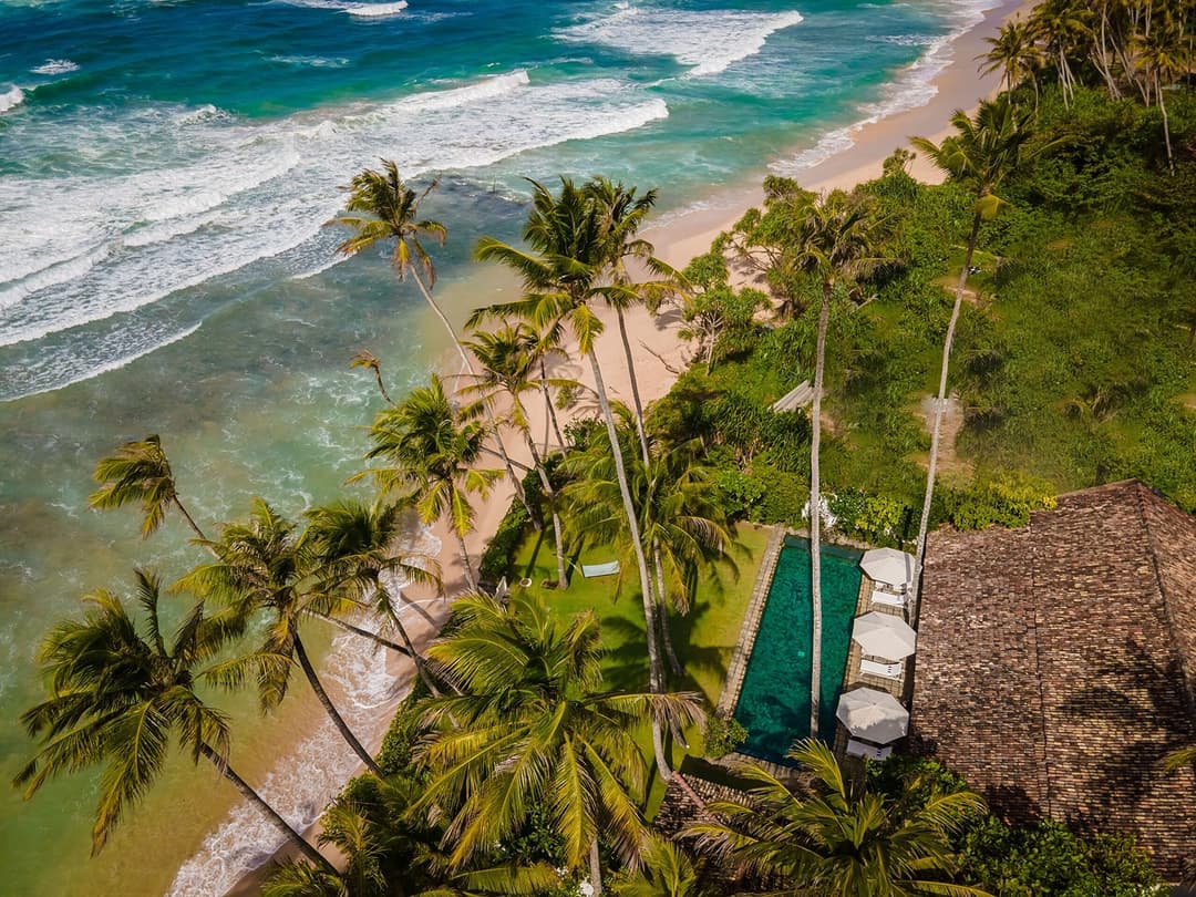 Tide House Habaraduwa aerial pool and thatched building