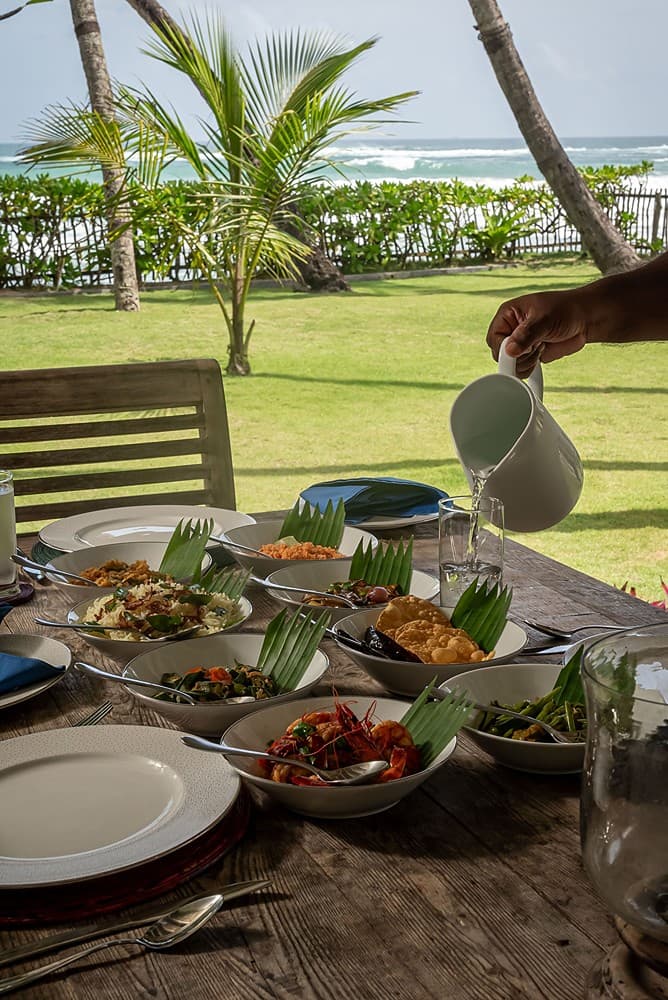 Habaraduwa table setting with drink pour in garden