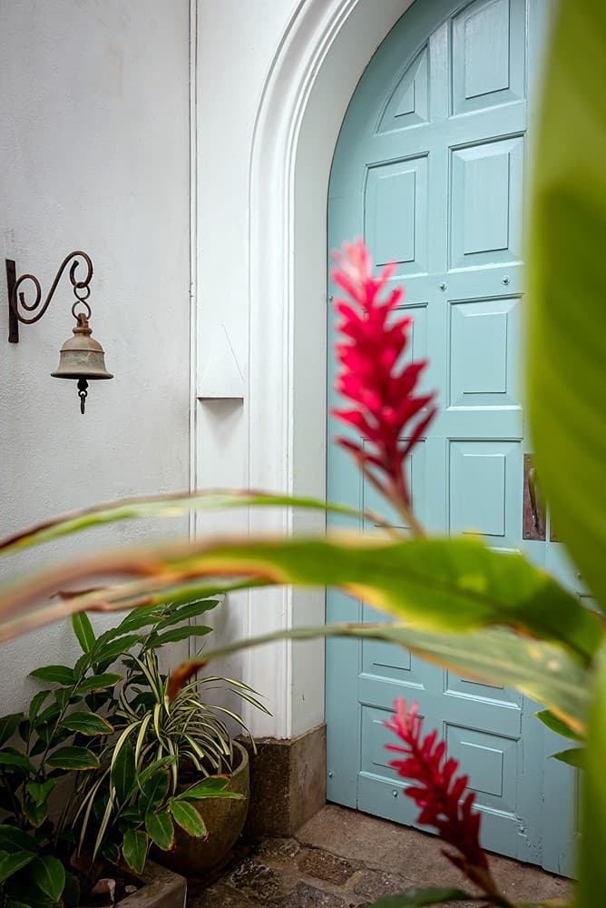 Habaraduwa garden pathway leading to blue door