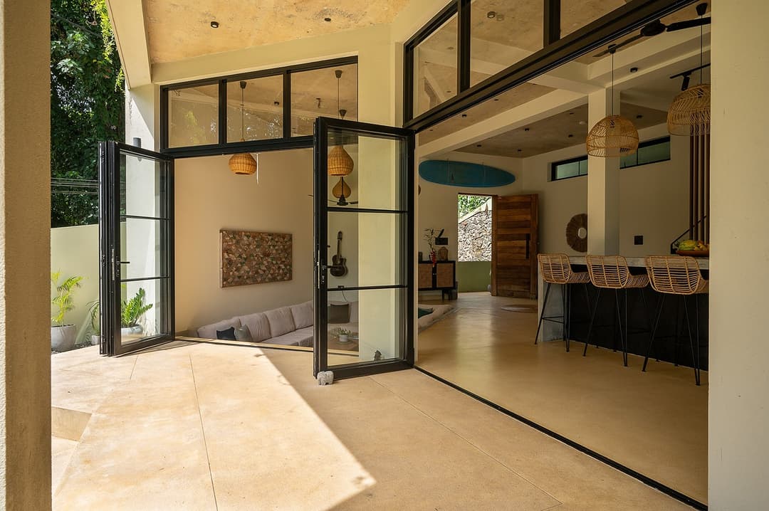 Kanda House Talpe entrance hall with open doors