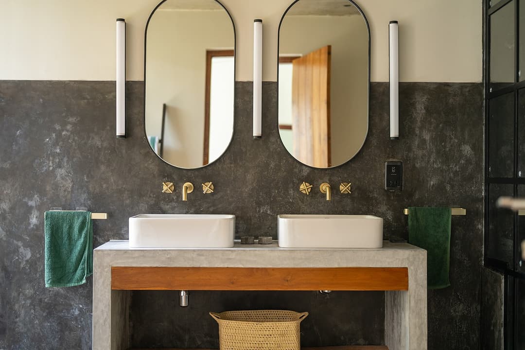 Talpe bathroom double sink in dark stone
