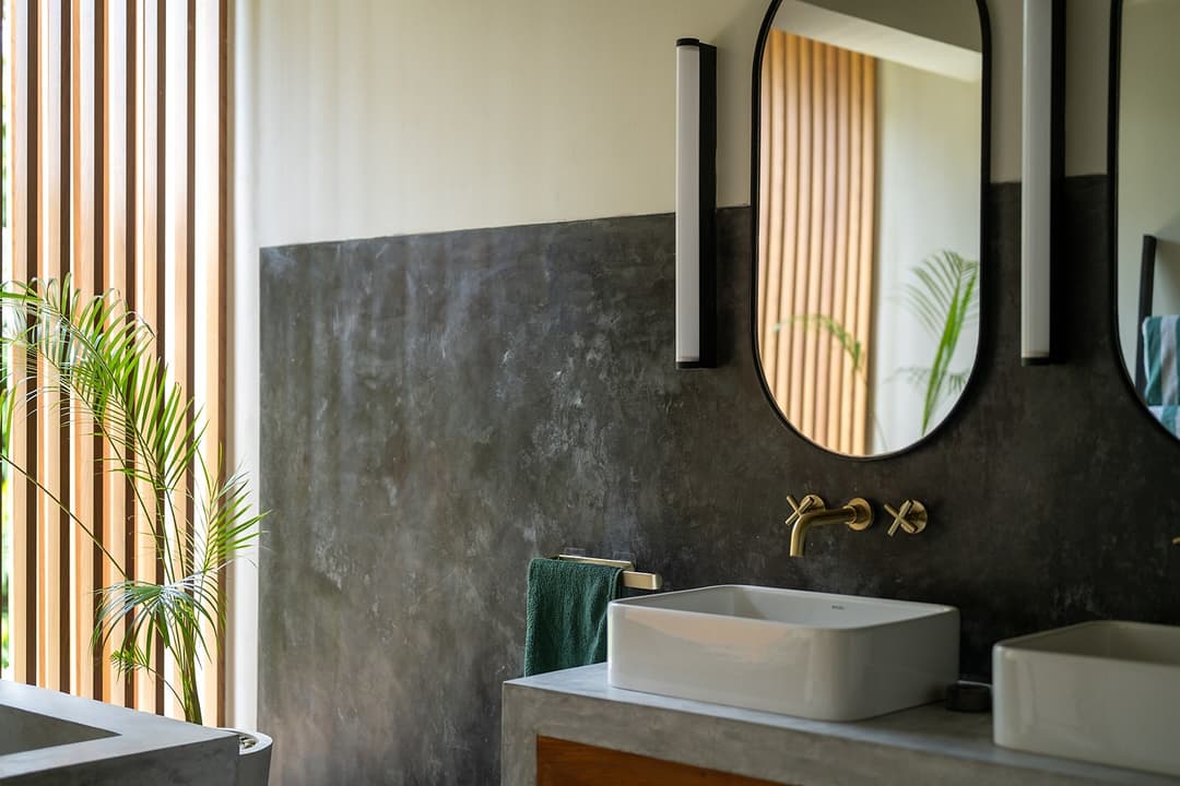 Talpe bathroom sink in dark stone