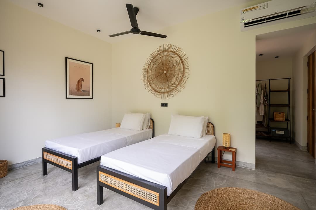 Talpe bedroom with twin beds interior