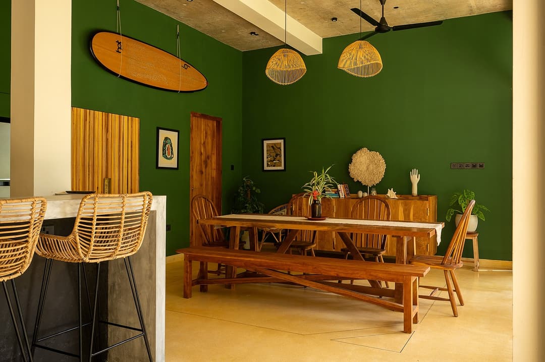Talpe dining room with green wall interior