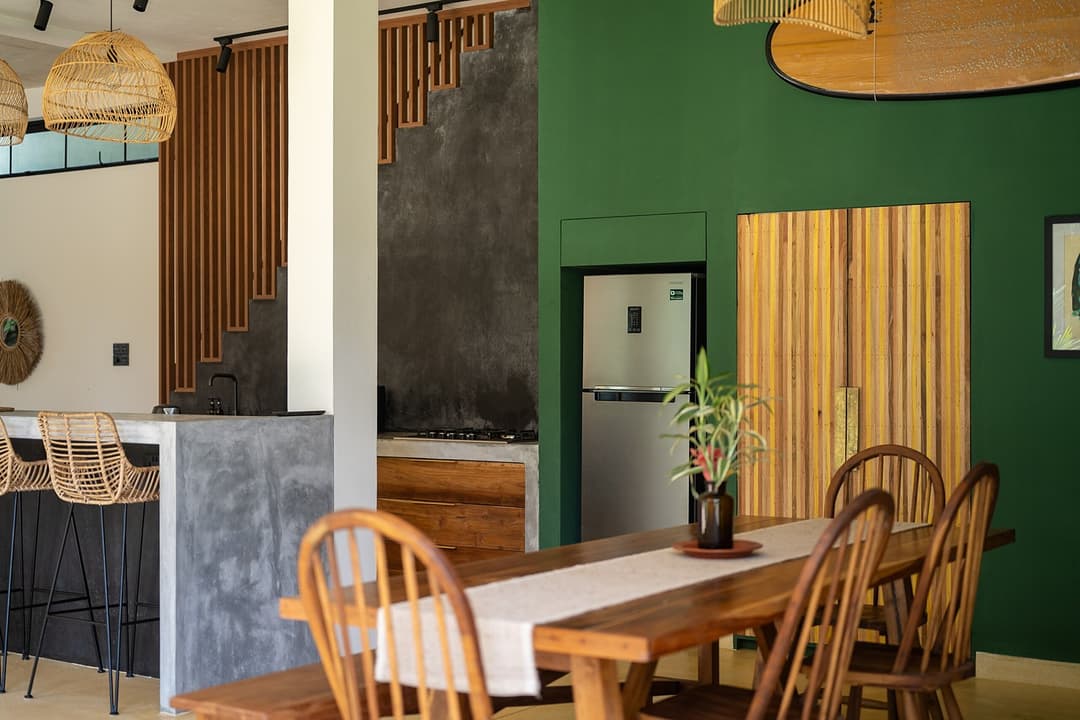 Talpe kitchen dining green wall view