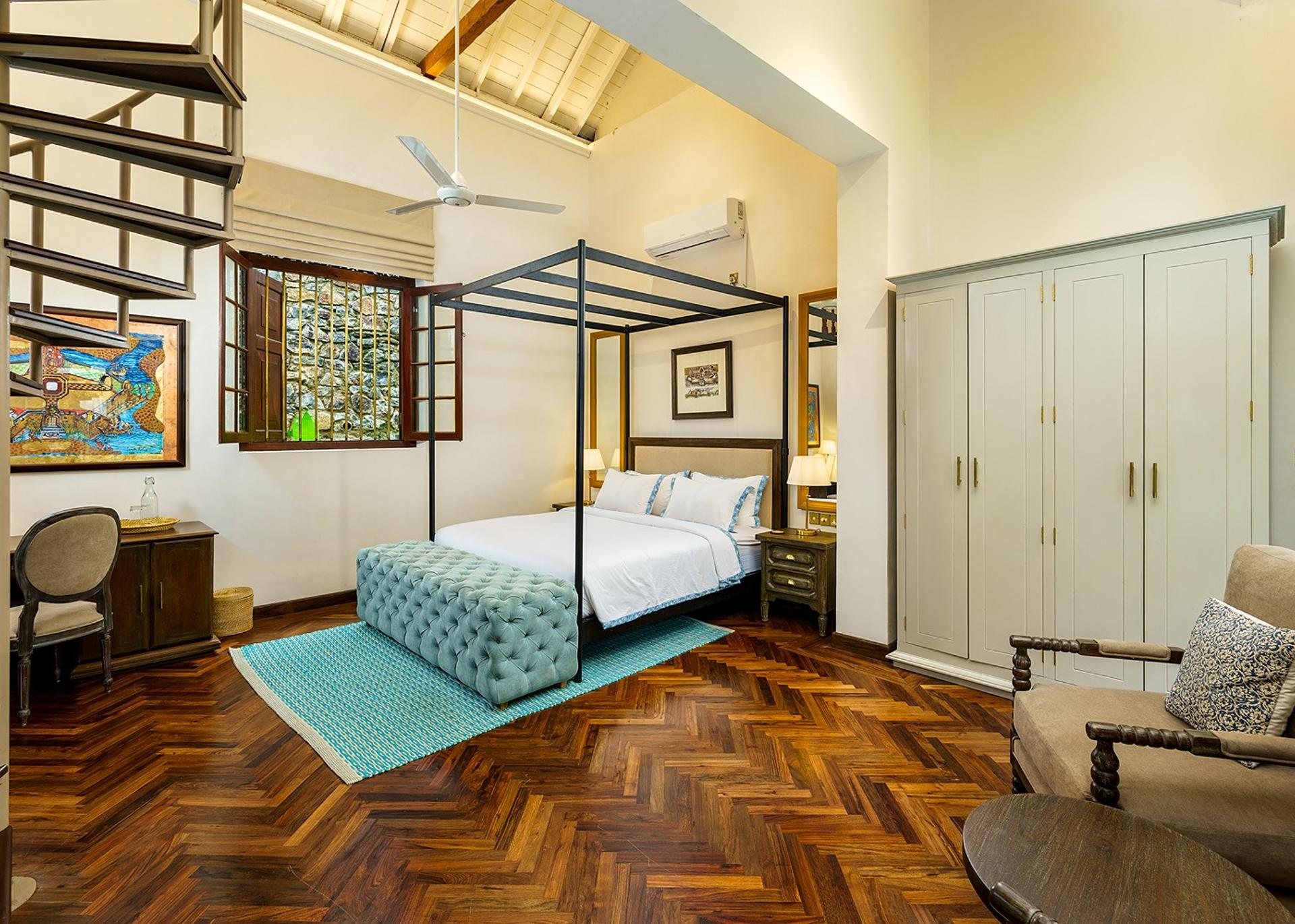 Elliot House Ebony Suite with four-poster bed and dark timber finishes in Galle