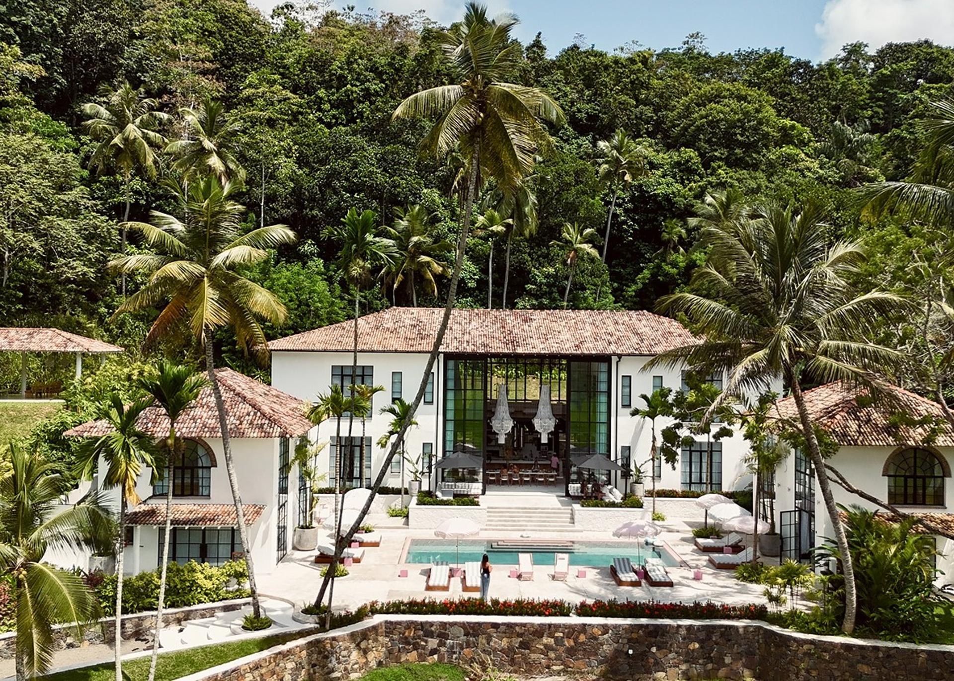 Miss Ceylon Unawatuna aerial view of hotel pool and tropical gardens daytime
