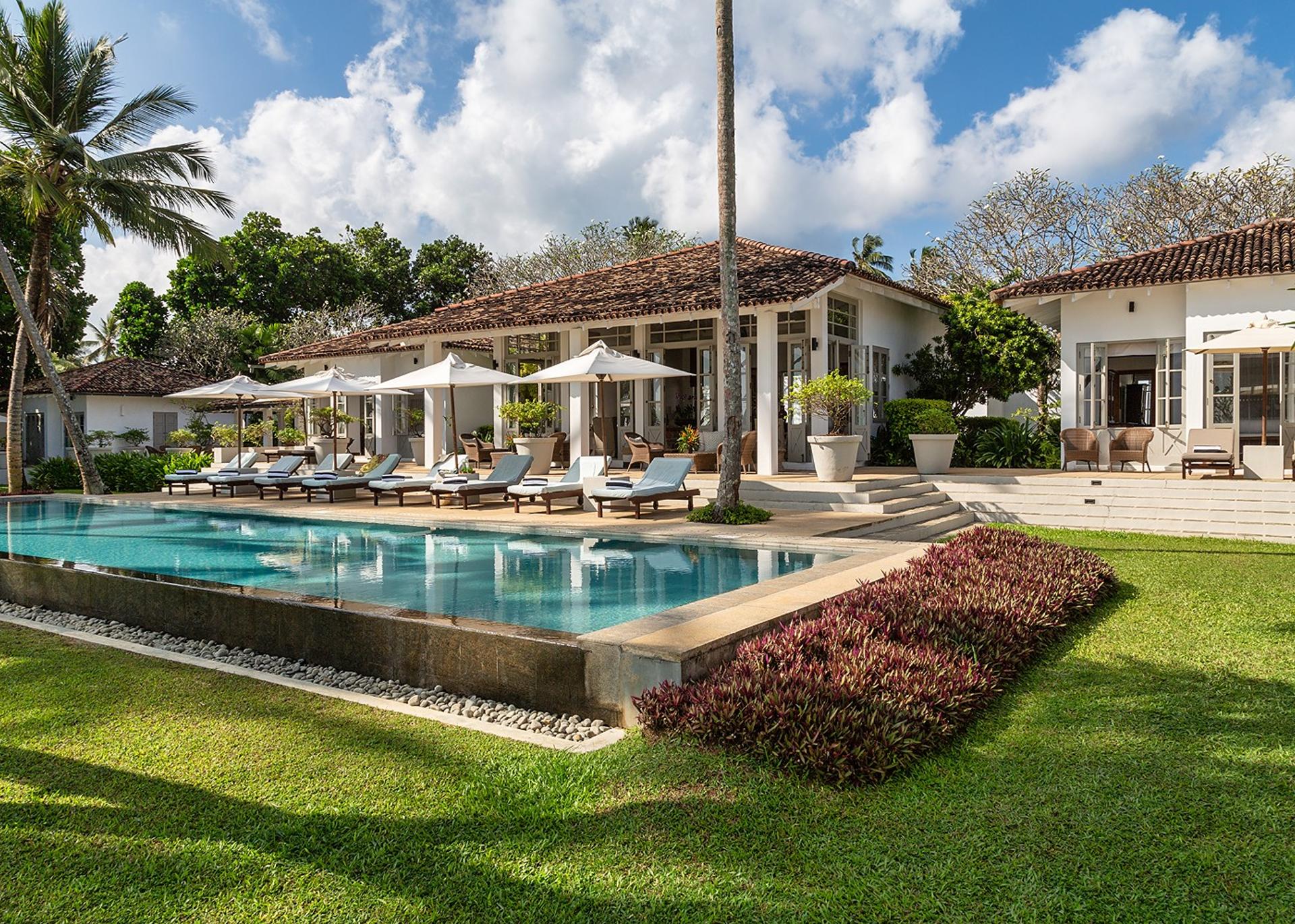 Daytime view of Habaraduwa House pool and colonial exterior, Habaraduwa, Sri Lanka