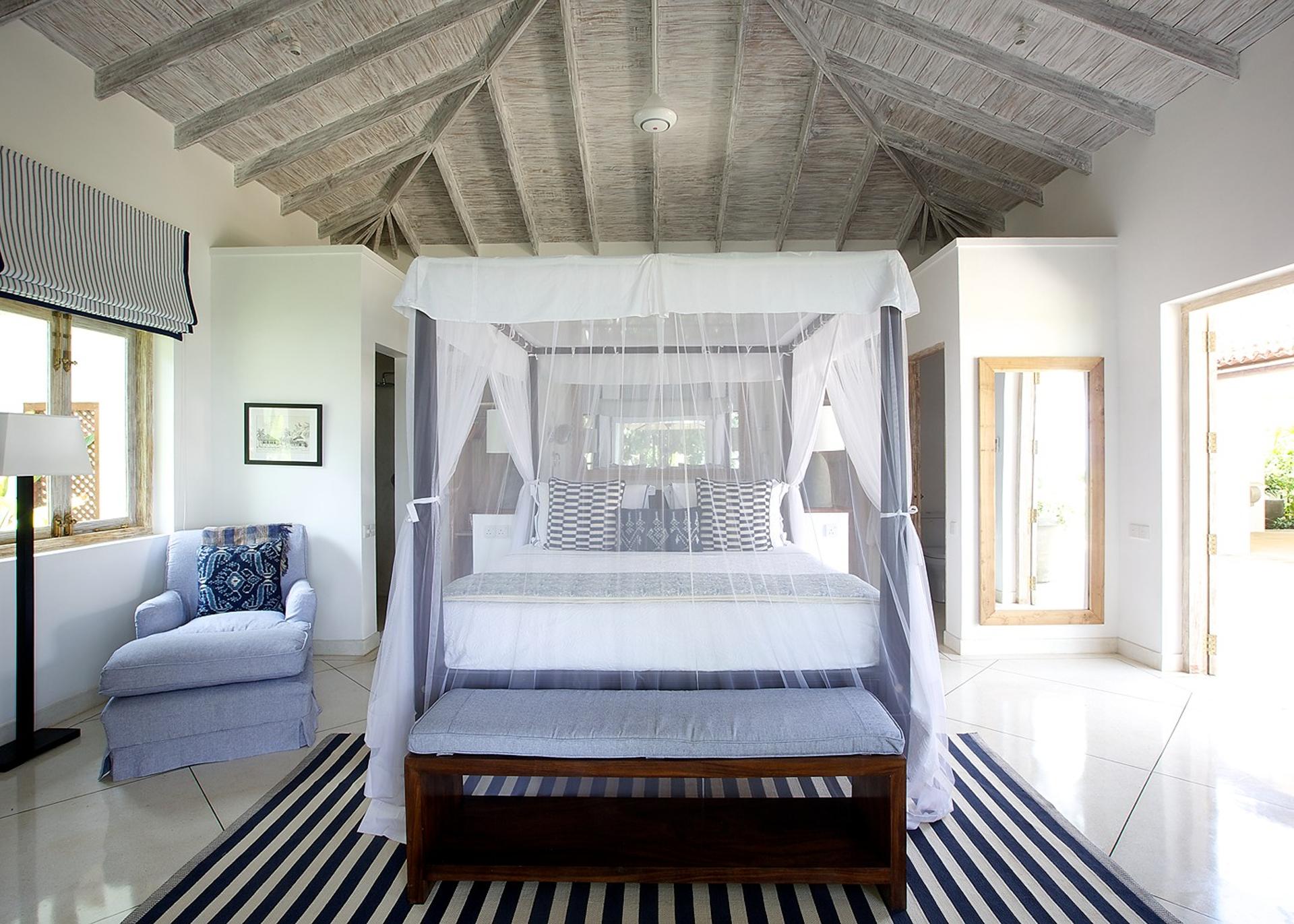 Wide view of Bedroom 3 with ocean light and canopy bed at Habaraduwa House, Sri Lanka