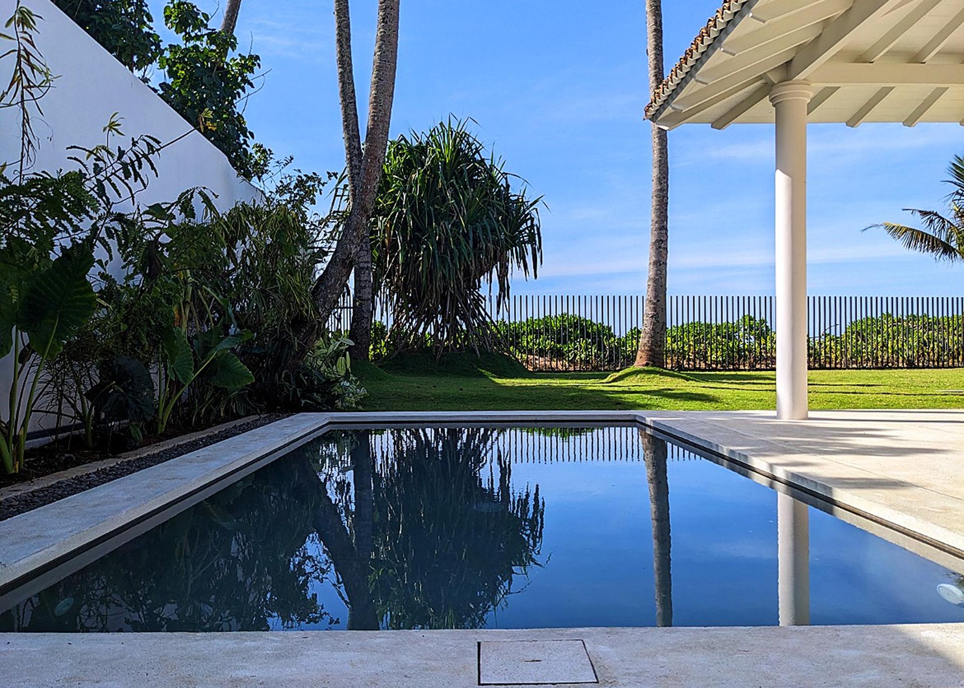 Salt and Stone pool with colonial colonnades and tropical garden, Ahangama, Sri Lanka