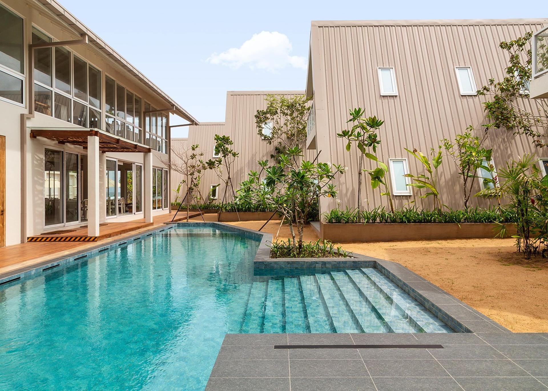Close daytime view of Asaya Sands Mirissa pool and chalets, Mirissa, Sri Lanka