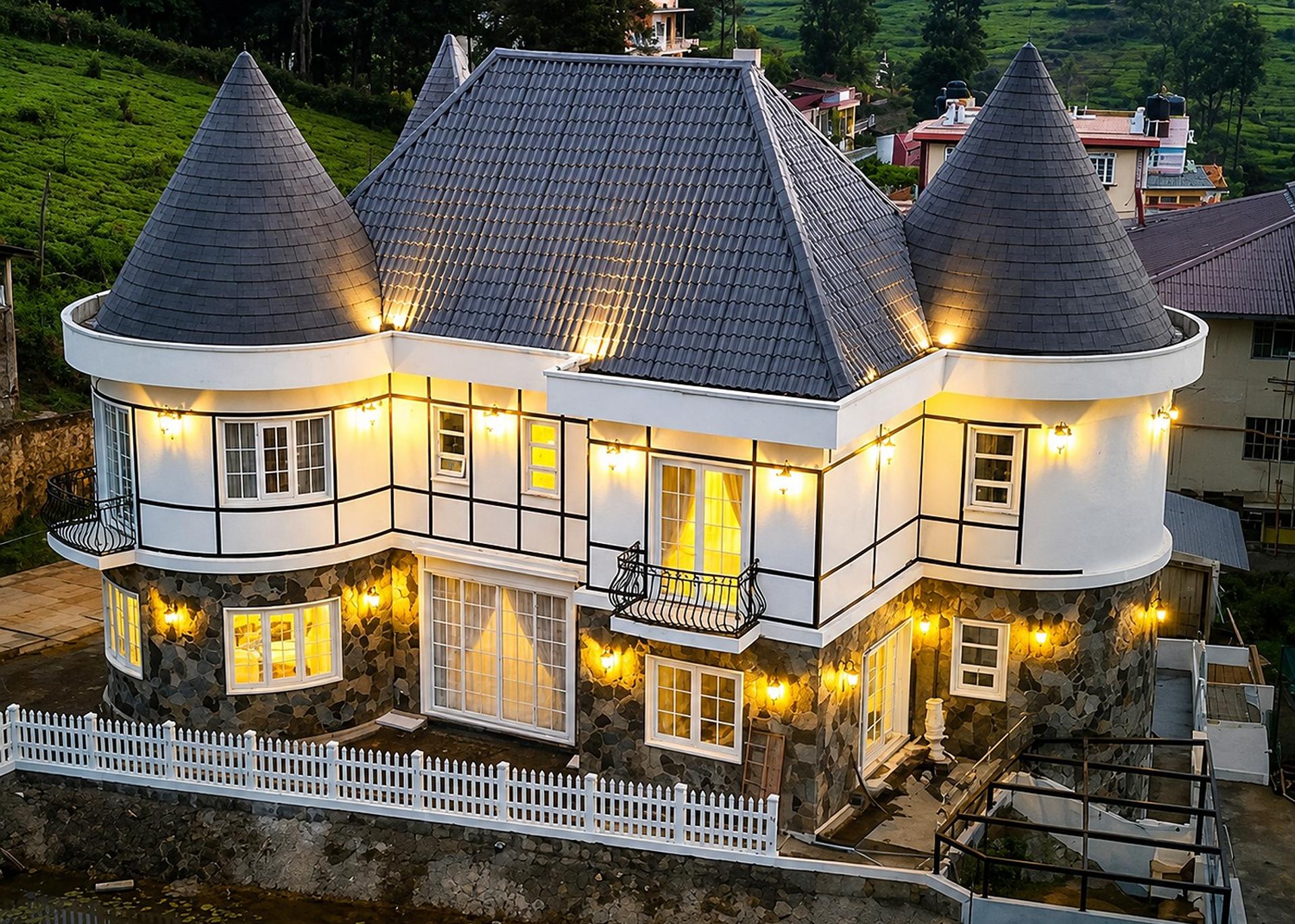 Castle exterior lit at night, The Mystique Nuwara Eliya