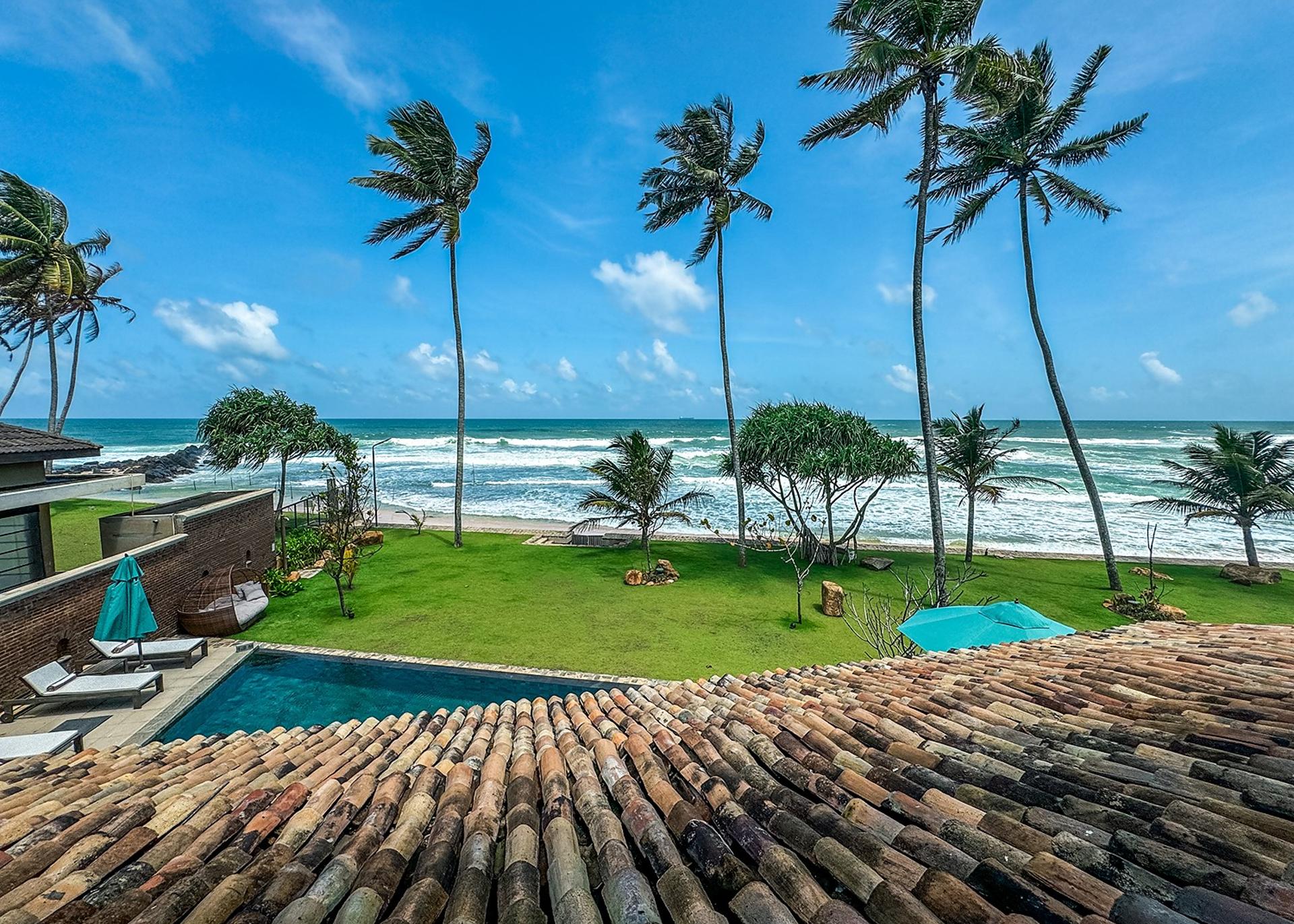 Pool and beach palm view, Candella House Talpe