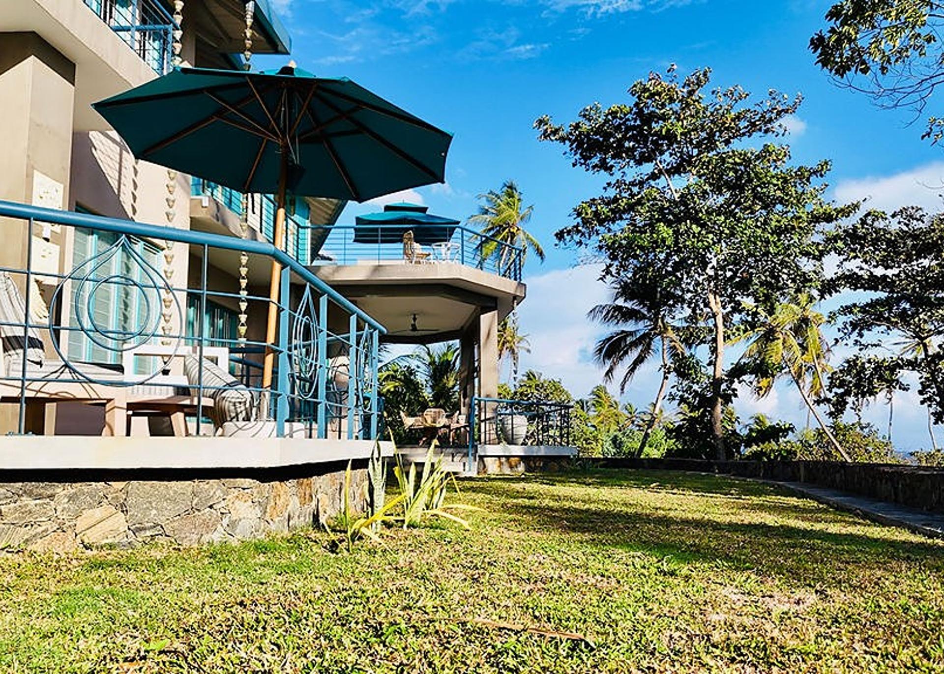 Drone aerial exterior with palms, Villa Monara Tangalle