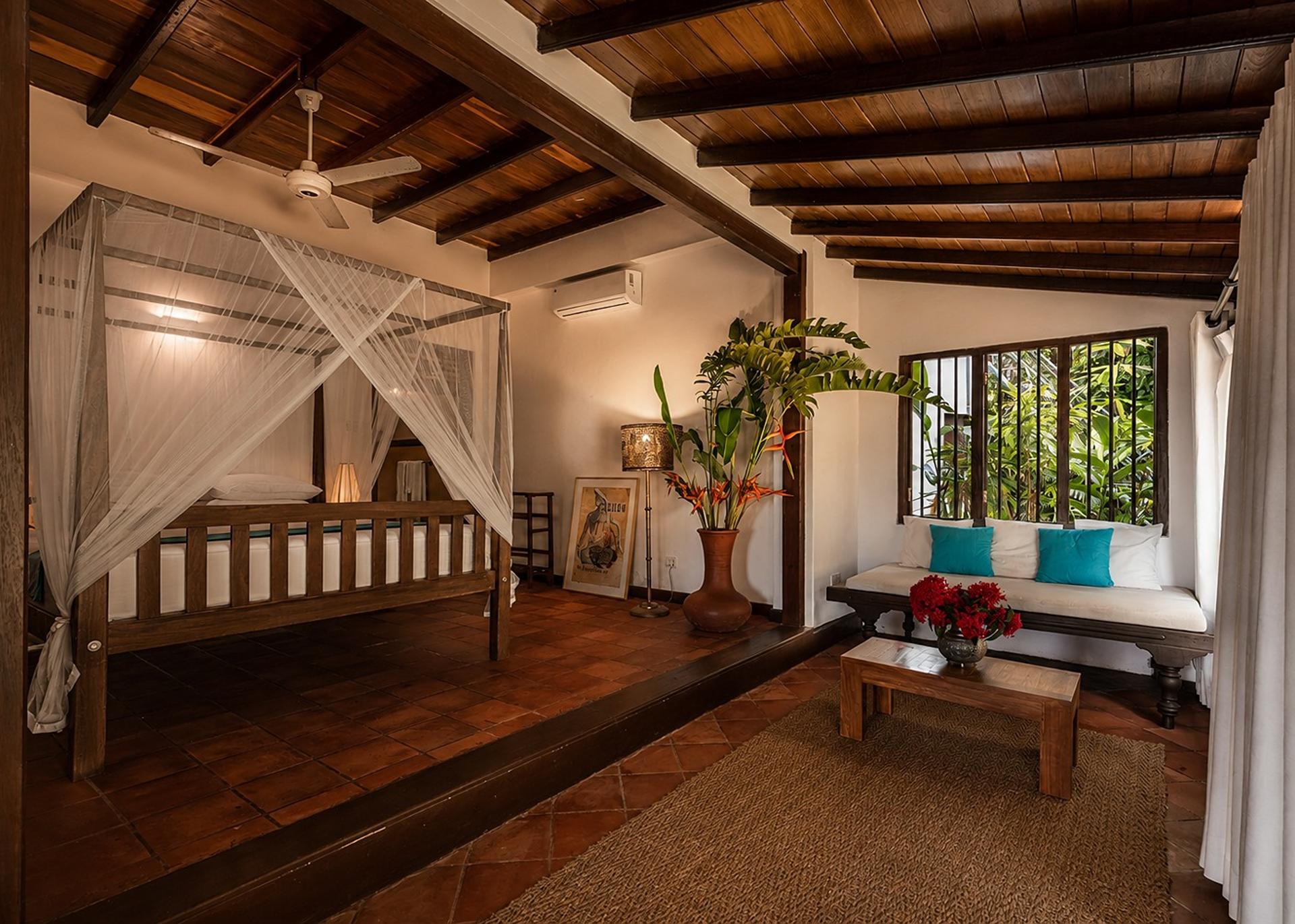 Koggala Lake bedroom with canopy bed interior