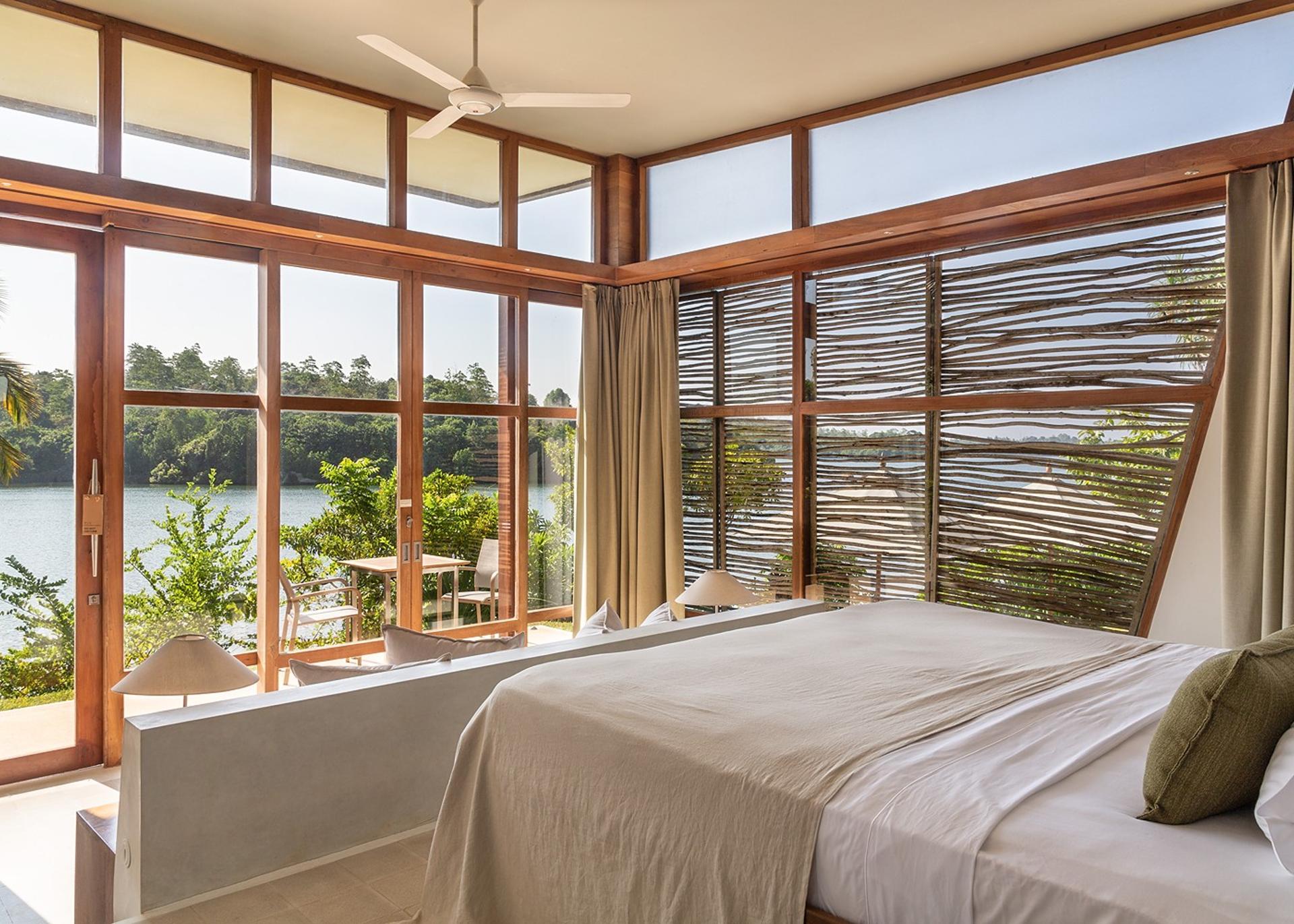 Tri Ahangama Family Villa bedroom with lake view