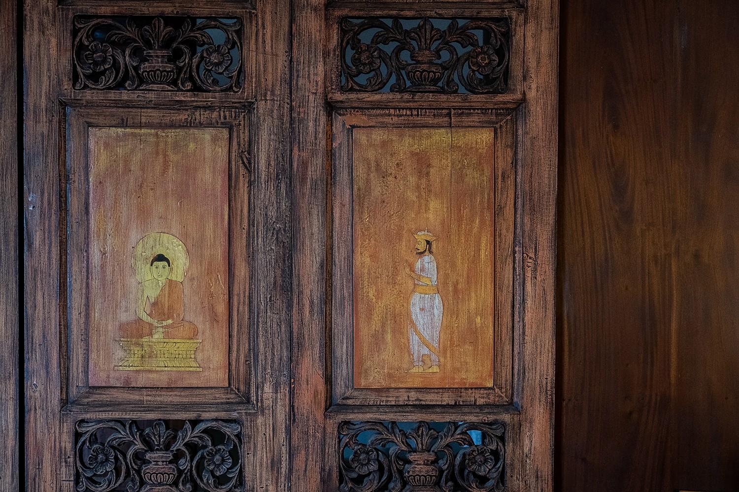Matara villa antique carved timber doors with Sri Lankan artwork panels